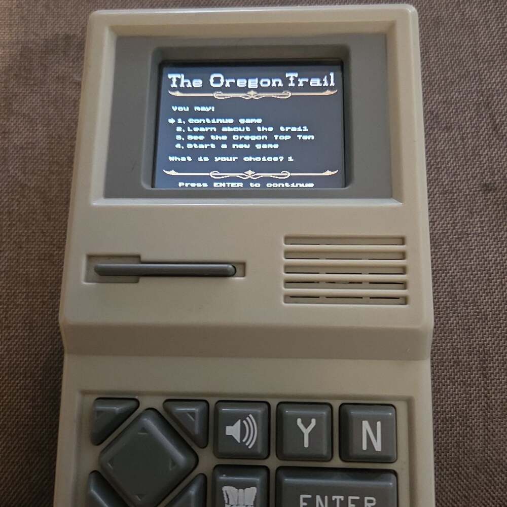 The Oregon Trail Handheld Electronic Video Game 2017 Color & Sound